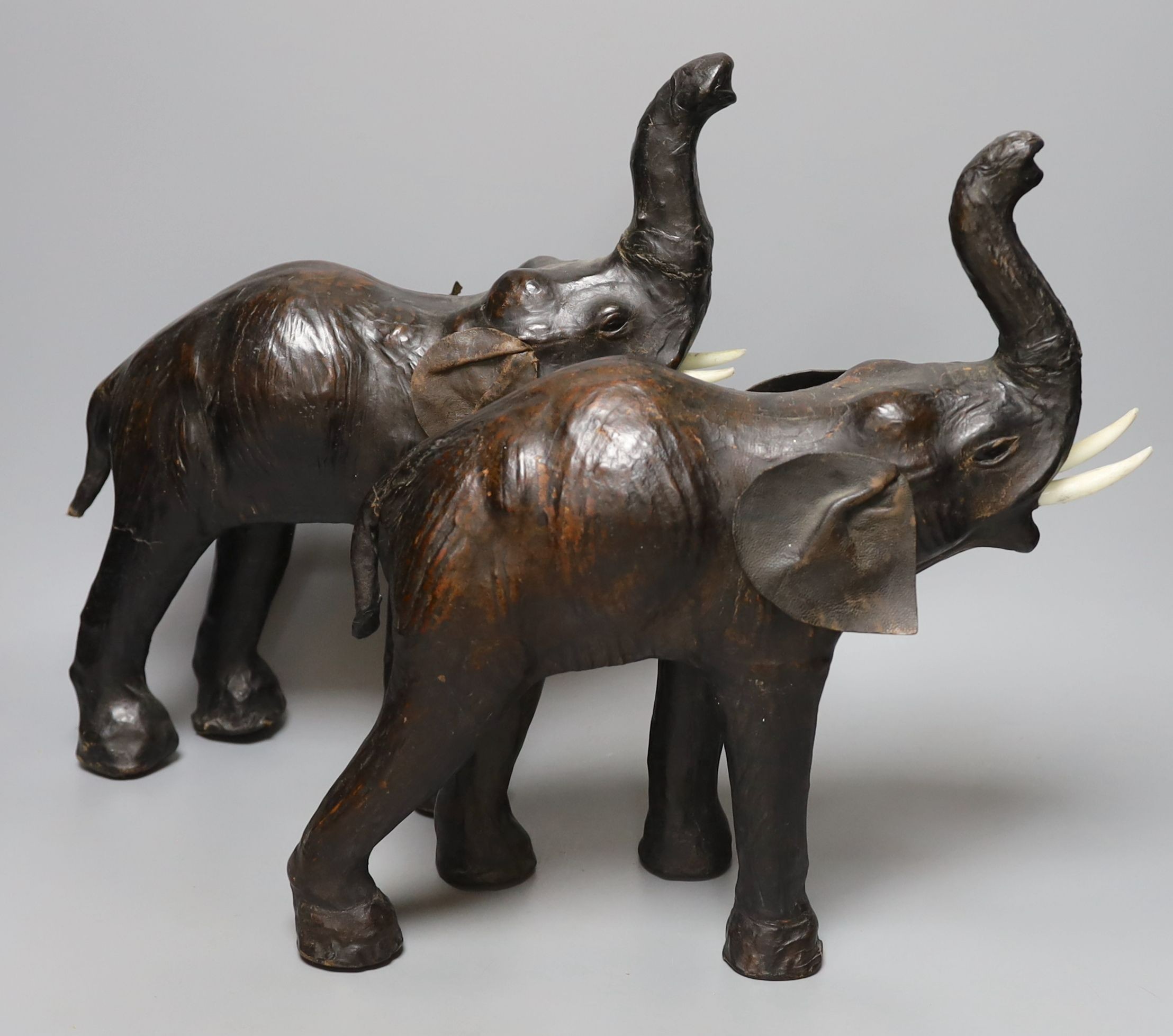 A pair of Liberty style leather mounted elephants - 36cm tall